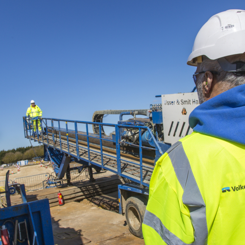 VolkerTrenchless Solutions employee on site with HDD rig.