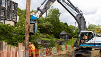 Man installing a pile