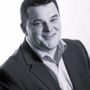 Head shot of Matt Kelly in black and white