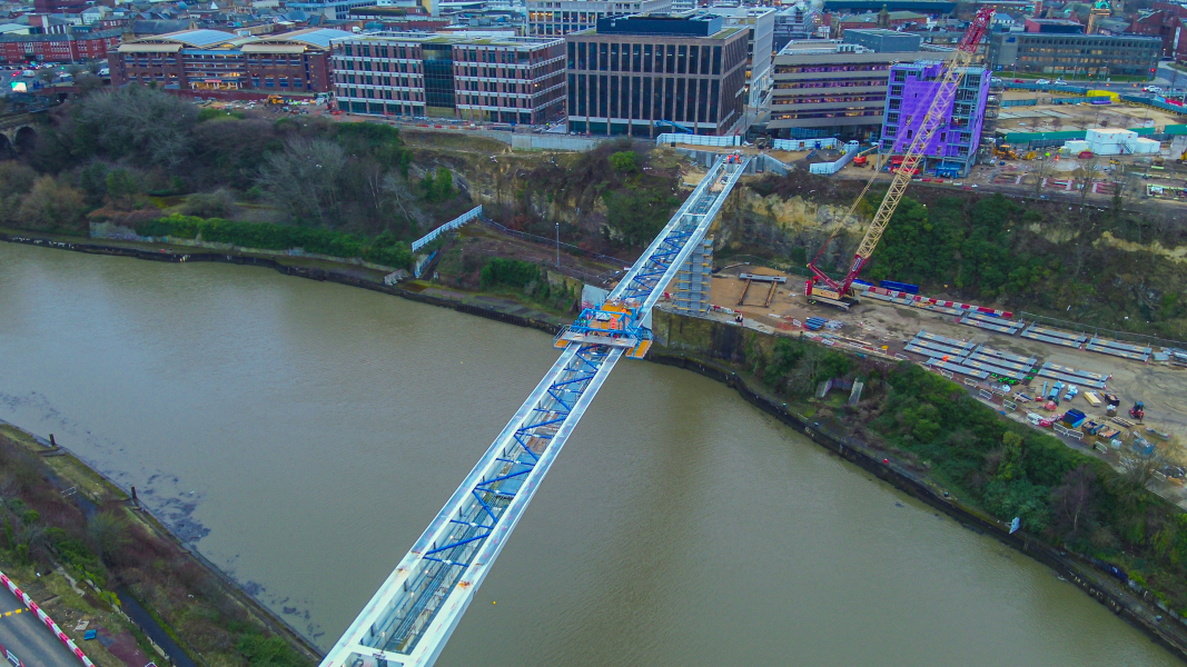 Aerial view of footbridge being built over River Wear