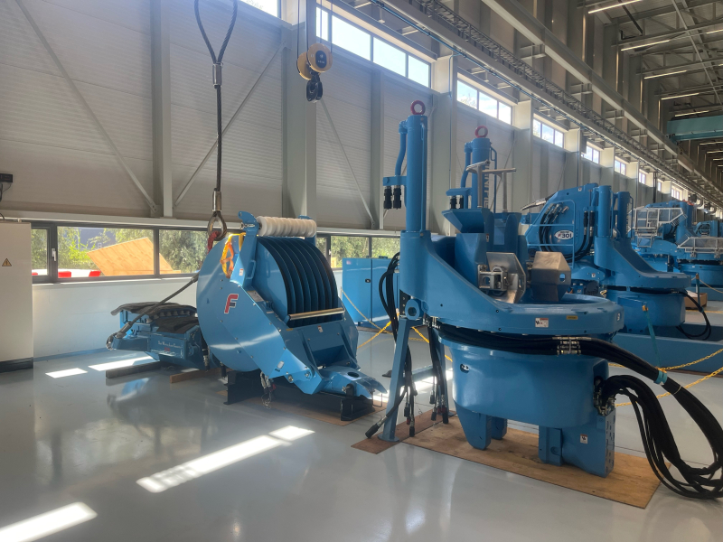 Large two piece piling machine in blue 