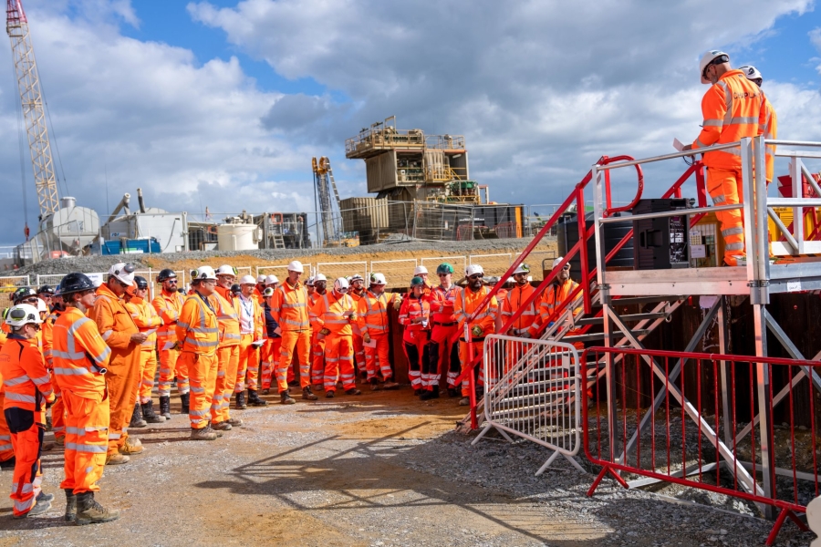 Men stood around a rig.