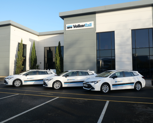 Three self-charging hybrid vehicles outside VolkerRail's office