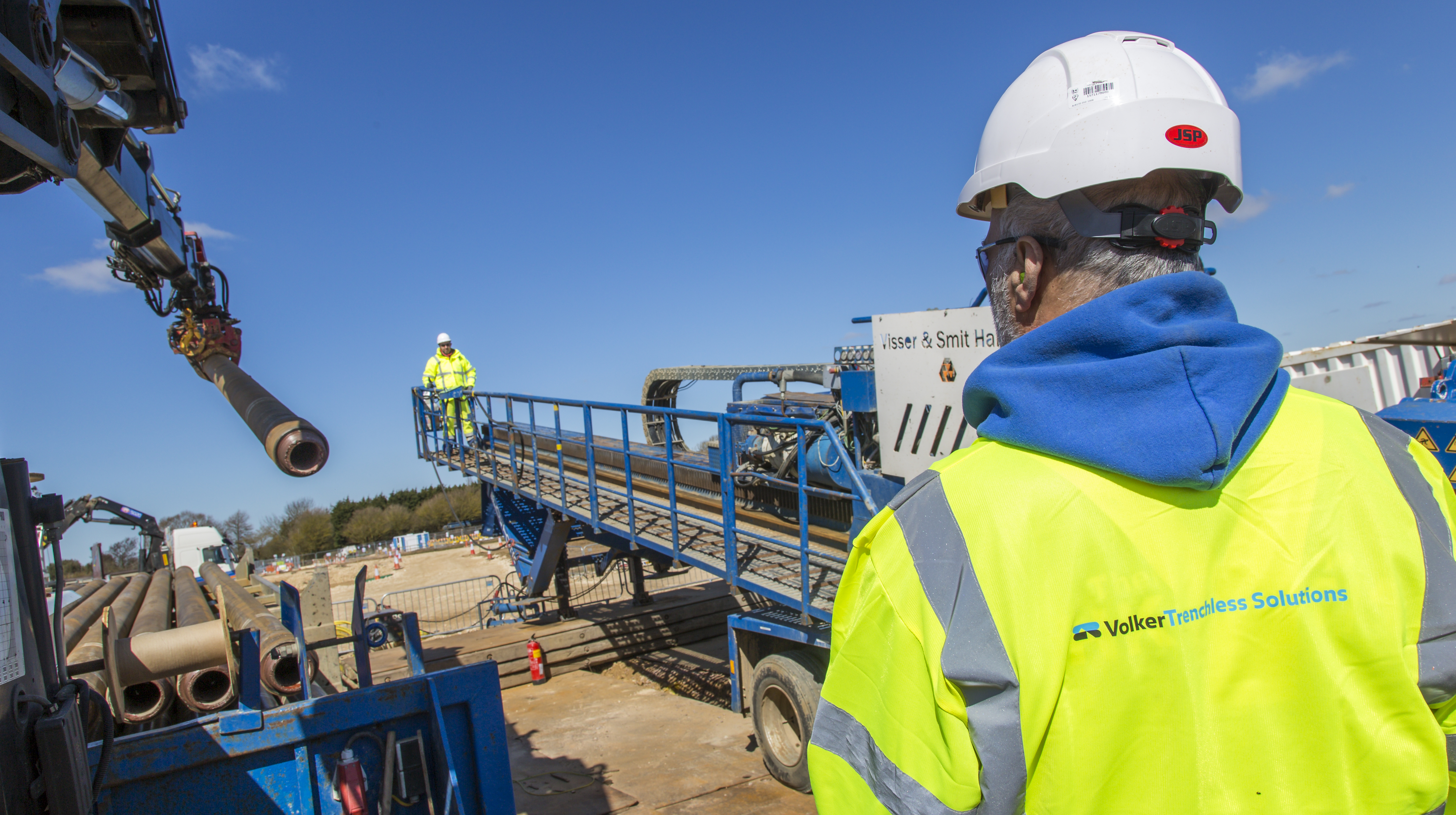 VolkerTrenchless Solutions employee on site with HDD rig.