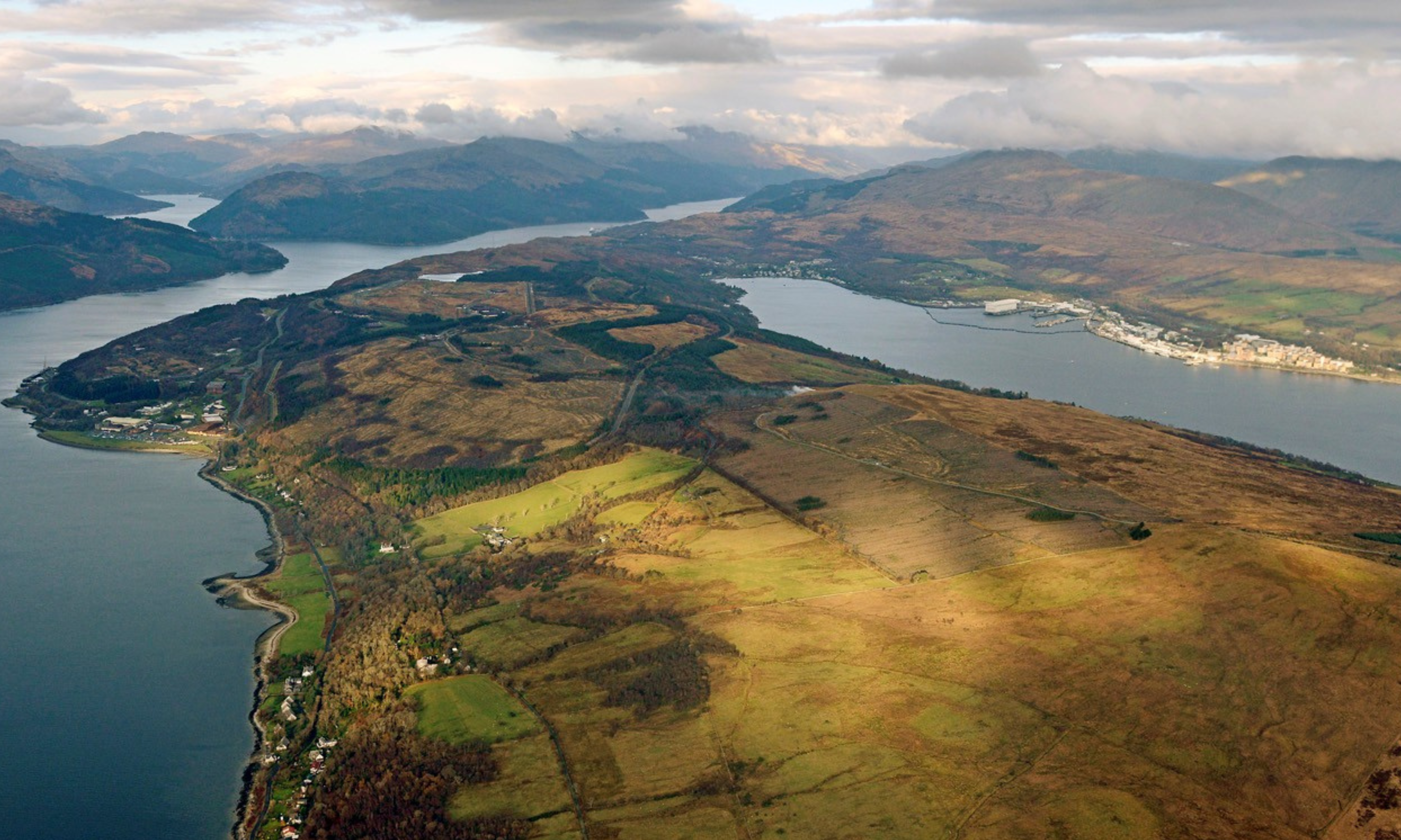 Aerial of rugged landscape with Lochs either side