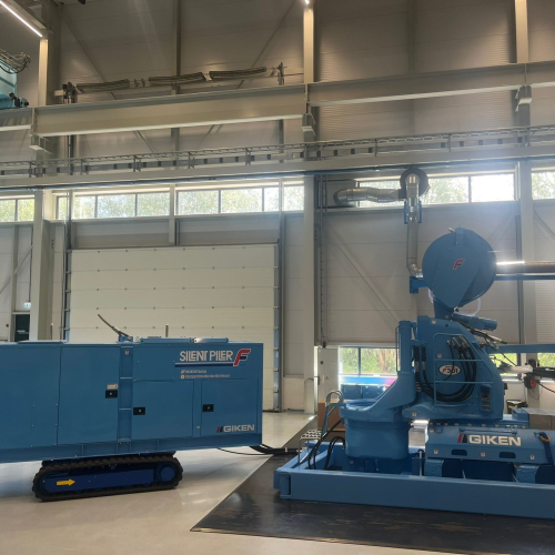 Large two piece piling machine in blue