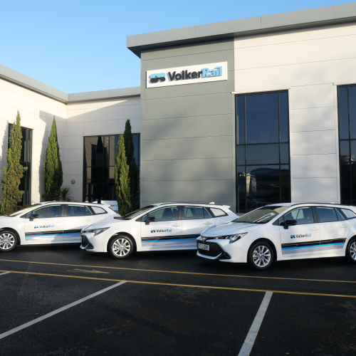 Three self-charging hybrid vehicles outside VolkerRail's office