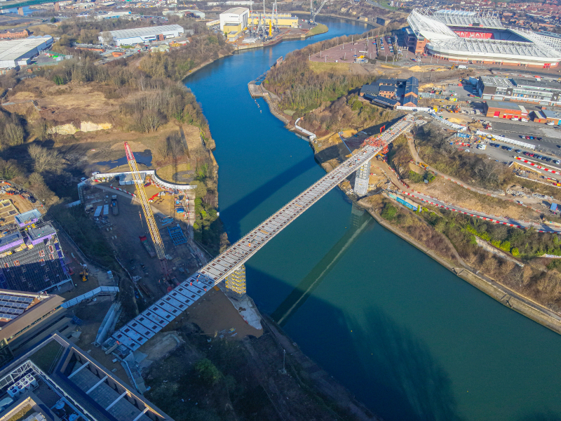 The tailor-made trolley system has been integral to the success of the bridge construction. The system harnesses winches that manoeuvre a “trolley” from the south to the north carrying the deck planks to where they will be positioned.   Platforms on the trolley’s sides allow operatives access to the outer edge of the deck plank to lower and then lock the planks in place.  Cllr Johnston added: “Sunderland has a proud history of construction and engineering innovation, so to see this tailor-made trolley worki