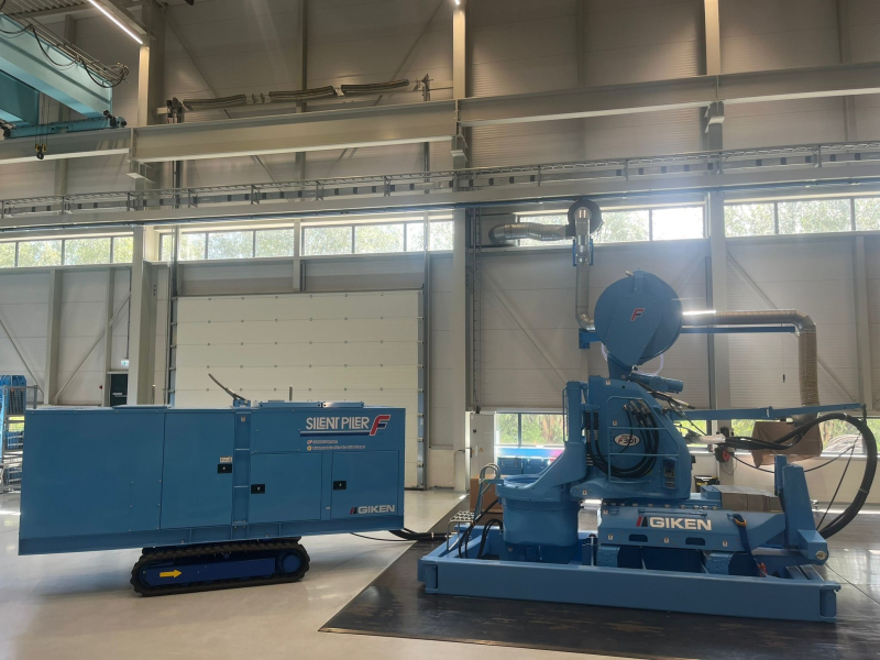 Large two piece piling machine in blue
